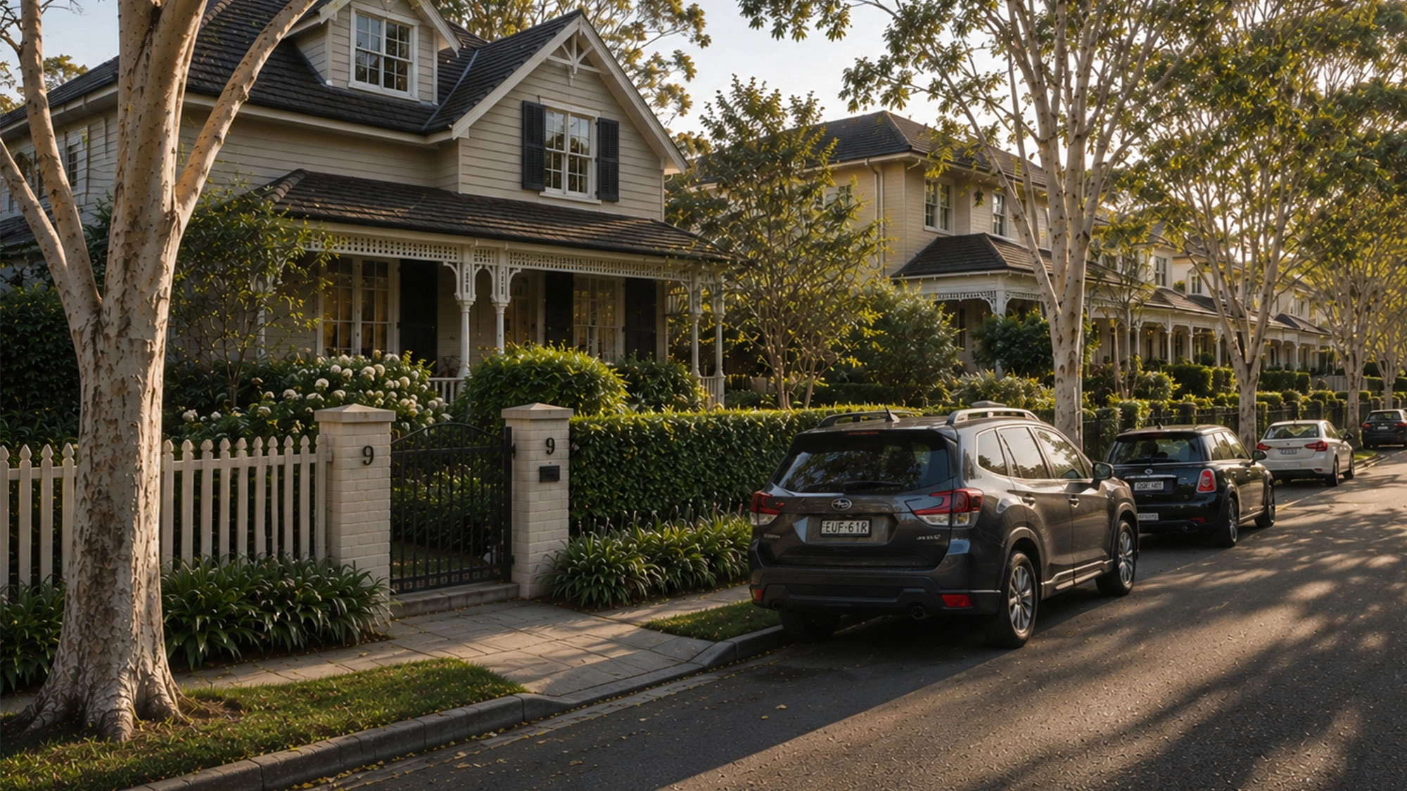 Sydney home and front garden set within a leafy streetscape, illustrating how a well-designed landscape contributes to the broader neighbourhood context.